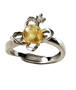 Forsølvet ring med facetteret gul rav Ring