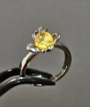 Forsølvet ring med facetteret gul rav Ring