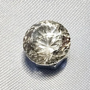 Gleaming Crystal: 4ct Facetted White Topaz - Gemstone