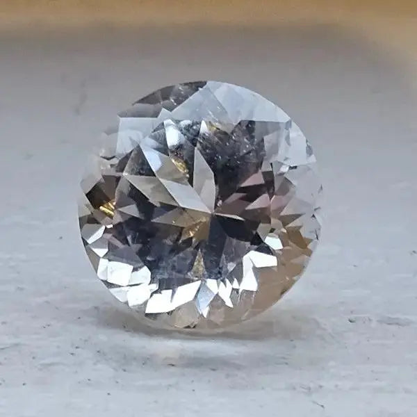 Gleaming Crystal: 4ct Facetted White Topaz - Gemstone