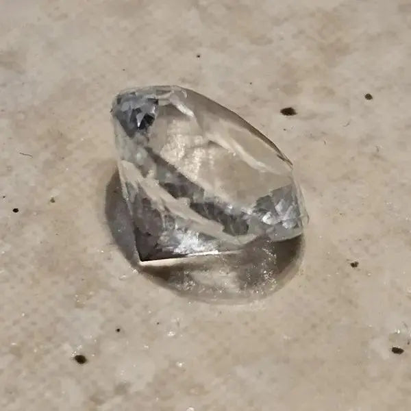 Gleaming Crystal: 4ct Facetted White Topaz - Gemstone